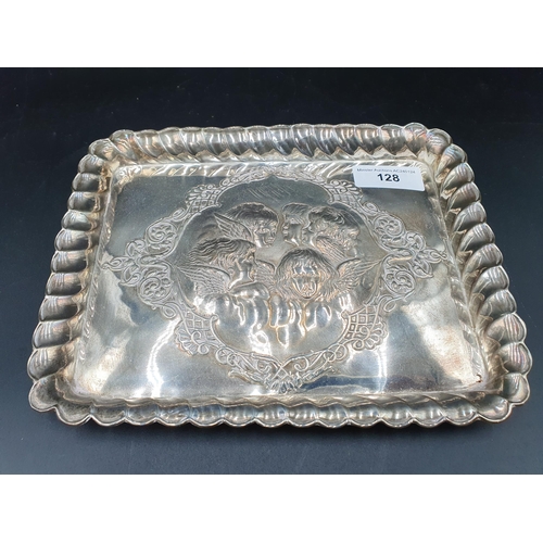 128 - An Edward VII silver Dressing Table Tray embossed cherub masks, Birmingham 1903, 10 x 7 1/2in