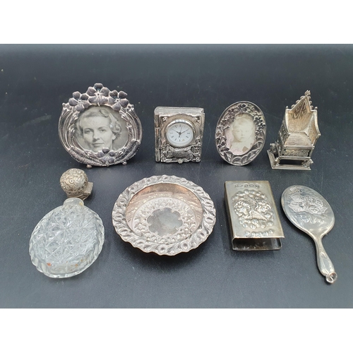 129 - An Edward VII silver miniature Prayer Book Cover and Mirror embossed cherub masks, Birmingham 1902 a... 