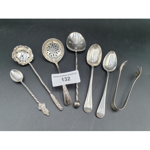 132 - A Victorian silver Sifting Ladle, Sheffield 1898, a Spoon with spiral stem, Birmingham 2000, silver ... 