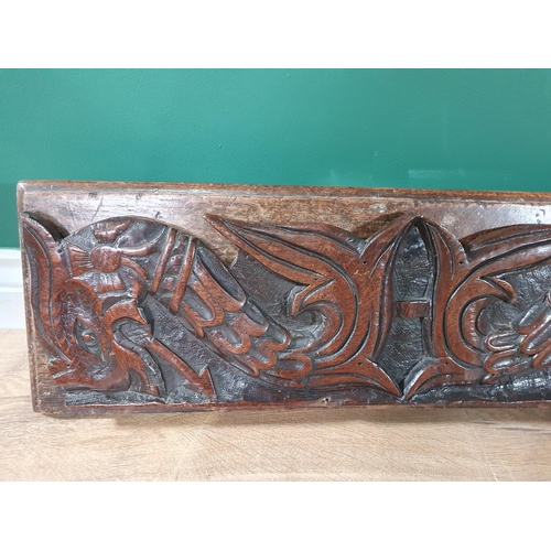 18 - A 17th Century oak Frieze with carved welsh Dragon decorations, 4ft 7