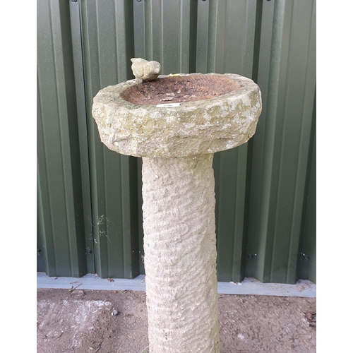 220 - A reconstituted Bird Bath with cylindrical column and stepped base, 2ft 9in H