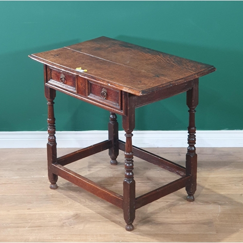 25 - A 17th Century oak Side Table with single fitted drawer on turned supports united by stretchers, 2ft... 