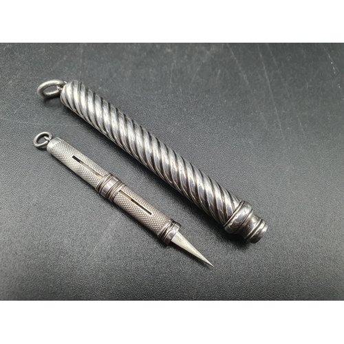 251 - A sterling silver Propelling Pencil of spiral form by S Mordan & Co, and a silver Toothpick, Birming... 