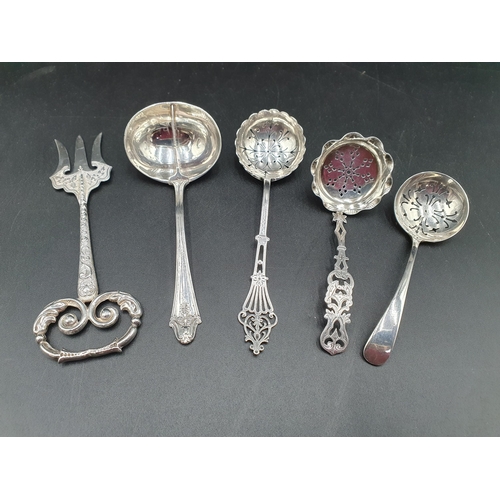 266 - A Victorian silver ornate Fork, Birmingham 1897, a silver Straining Ladle, Birmingham 1958 and three... 