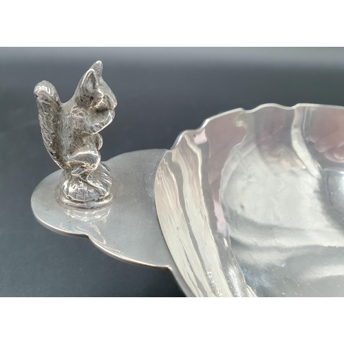 270 - A George VI silver shaped circular Nut Dish with squirrel finial, Birmingham 1937, 220gms