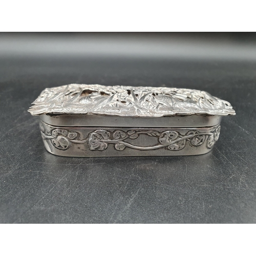 280 - An Edward VII silver Trinket Box, the hinged lid pierced and embossed swans amongst rushes, floral e... 