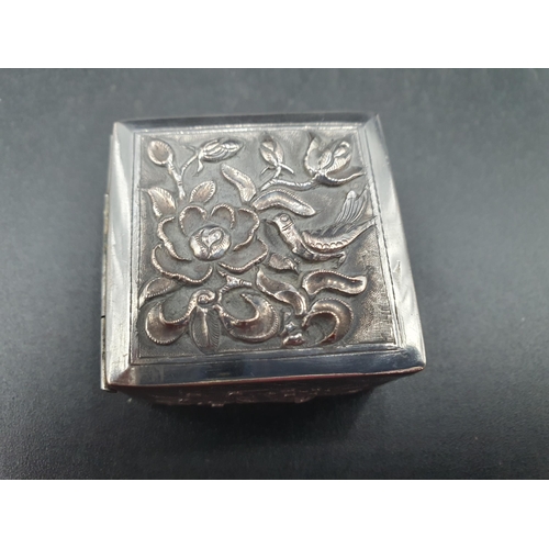 284 - A Chinese silver small square Box embossed and chased birds and flowers, character mark under