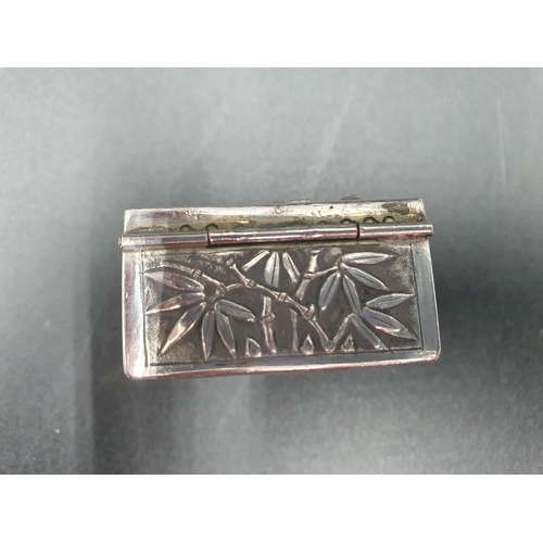 284 - A Chinese silver small square Box embossed and chased birds and flowers, character mark under