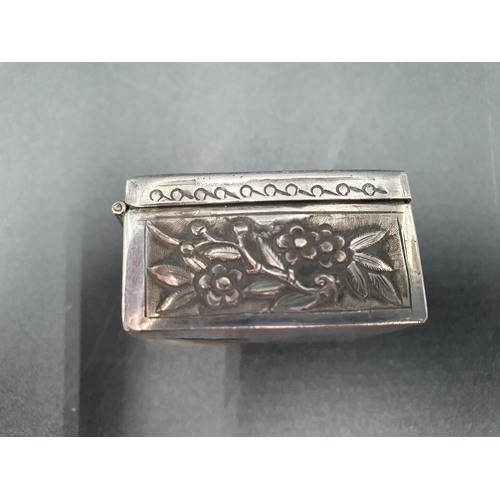 284 - A Chinese silver small square Box embossed and chased birds and flowers, character mark under