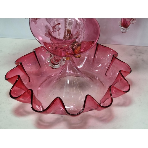 301 - A Victorian cranberry glass Epergne with flared and suspended flutes, 1ft 7in H