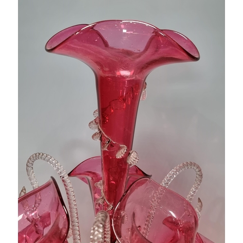 301 - A Victorian cranberry glass Epergne with flared and suspended flutes, 1ft 7in H