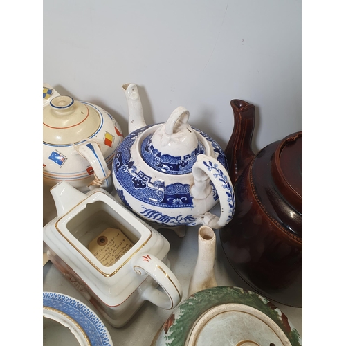 304 - Twelve assorted Teapots including a plated Royal Silver Jubilee, a Sadler Coronation Teapot, a stone... 