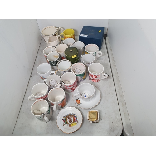 310 - A collection of Commemorative Mugs, including a boxed Royal Worcester Mug, a Wedgwood Mug, etc (R5)