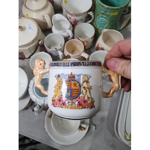 311 - A collection of Commemorative items including Teapots, a Biscuit Barrel, a Crown Ducall Jug, A/F, a ... 