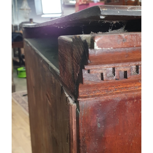 35 - A 19th Century mahogany Cupboard  fitted pair of panelled doors enclosing shelves above base fitted ... 