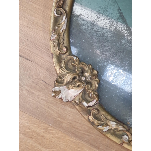 394 - A gilt framed Oval Wall Mirror with Eagle Surmount, 2ft 8