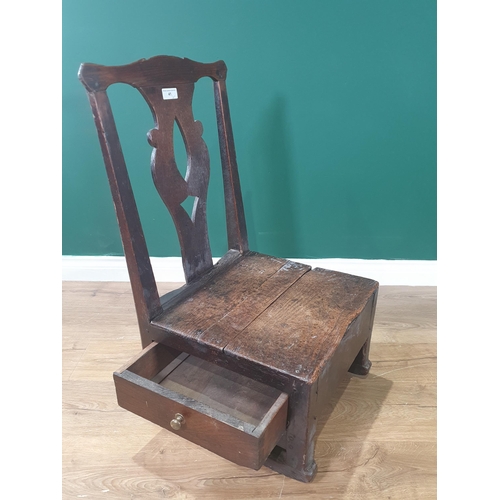 41 - An 18th Century oak Lambing Chair with pierced splat back and box base fitted side drawers 2ft 8in H... 