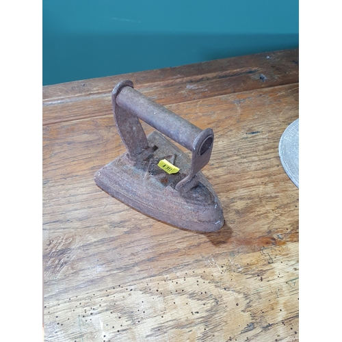 42 - A vintage oak School Desk, 2ft 8in High x 2ft Wide x 1ft 6in Deep, a Sundial and an Iron. (R9).