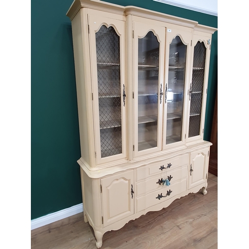 480 - A modern French style painted Display Cabinet, the top fitted four glazed doors enclosing fitted she... 