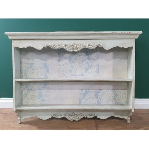 498 - A pair of pale blue French style Wall Shelves with carved scrolled leafage decorations, 2ft 6in H x ... 