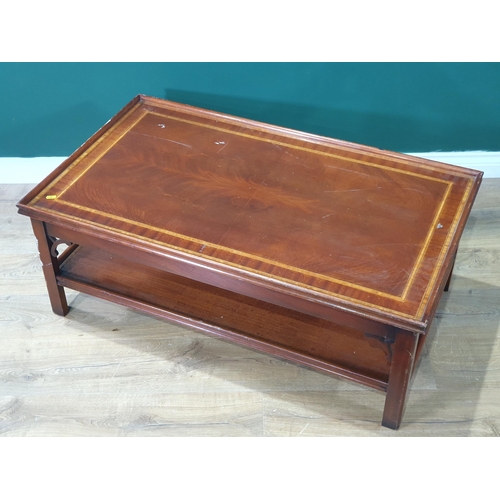 517 - A reproduction mahogany two tier Coffee table on chamfered supports, 16in High x 3ft 7in Long x 2ft ... 