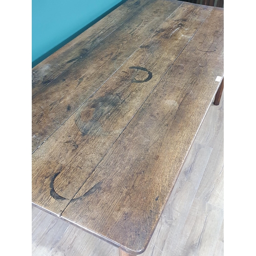 532 - An oak Dining Table with four plank top, above single fitted drawer, raised on chamfered supports, 2... 