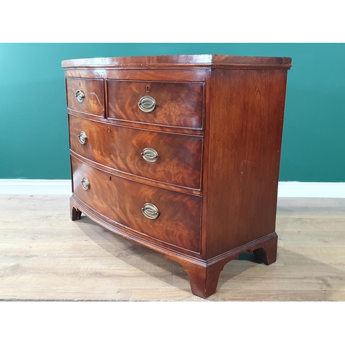 535 - A mahogany bow front Chest of two short and two long drawers on bracket feet, 2ft 9in H x 3ft 4in W ... 