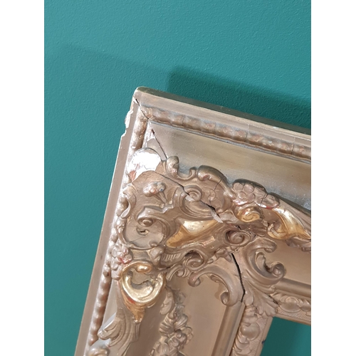 550 - A large gilt Picture/Mirror Frame with scroll and floral decorations, A/F, 3ft 5in High x 4ft 3in Wi... 