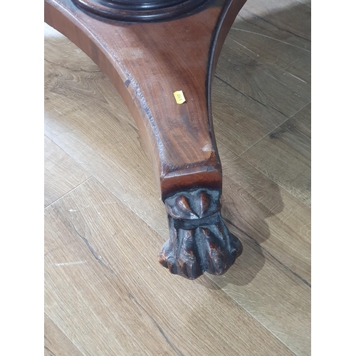 563 - A 19th Century mahogany Breakfast Table with claw feet, 46in diam (R7)