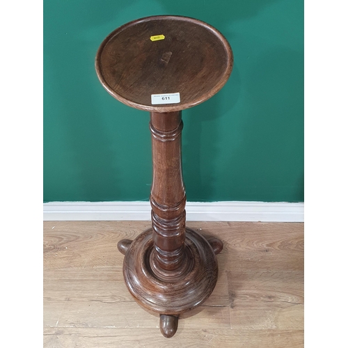 611 - A Lignum Vitae torchiere stand dated 1850-, 3ft H