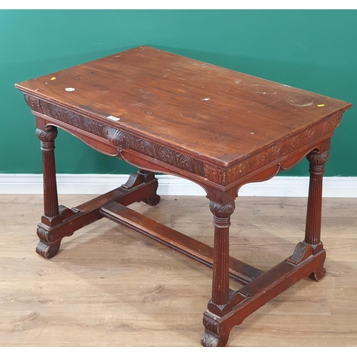 641 - A mahogany Side Table fitted drawer with leafage carving and fluted legs (R8)