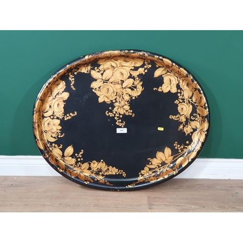 649 - A large antique papier mache Tray with gilded rose decoration, 31in x 25in