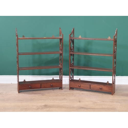 661 - A pair of mahogany Wall Shelves with fret carved sides and fitted drawers to the base, 2ft 3in H x 1... 