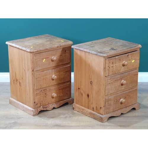 664 - A pair of pine Bedside Chests with three fitted drawers, A/F, 1ft 11