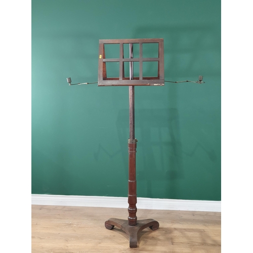 668 - A 19th Century Rosewood adjustable Duet Music Stand with pair of adjustable candle sconces, raised o... 