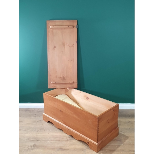 670 - A pine Blanket Box on shaped plinth base, 19