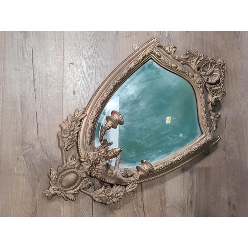 675 - An antique gilt shield shaped Wall Mirror with three candle branches, A/F (R8)