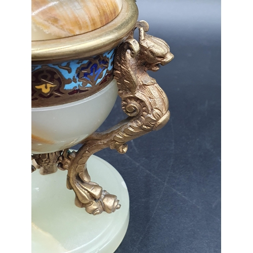 68 - A gilt metal and champleve enamel mounted Inkwell and Cover with three griffin scroll supports on ci... 