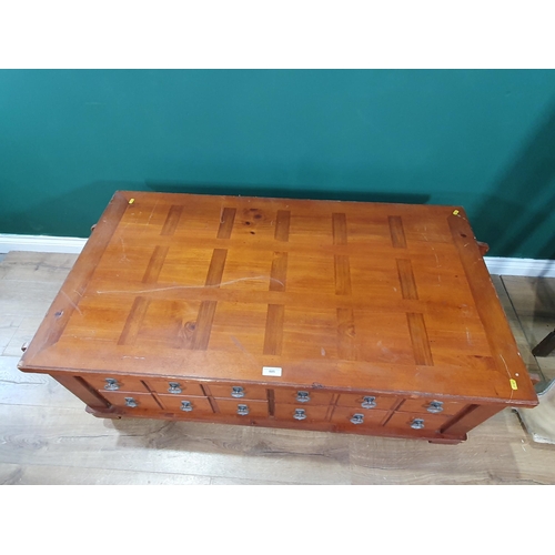 685 - A modern rectangular Coffee Table with six fitted drawers, with magazine rack at each end, 4ft 3