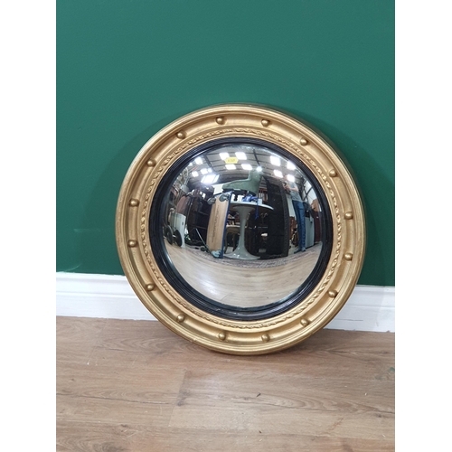 696 - A gilt framed Convex Wall Mirror, 1ft 9