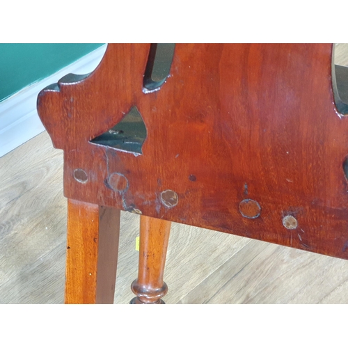 699 - A pair of mahogany Hall Chairs with shaped backs, on turned front supports, A/F. (R9).