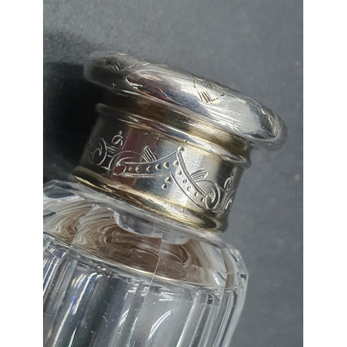 79 - A Leuchars of Piccadilly, London double ended clear cut glass Scent Bottle with engraved silver gilt... 