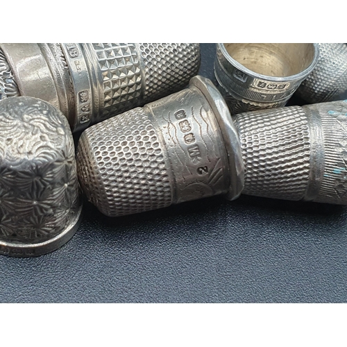 80 - Thirty three silver and white metal Thimbles, some A/F