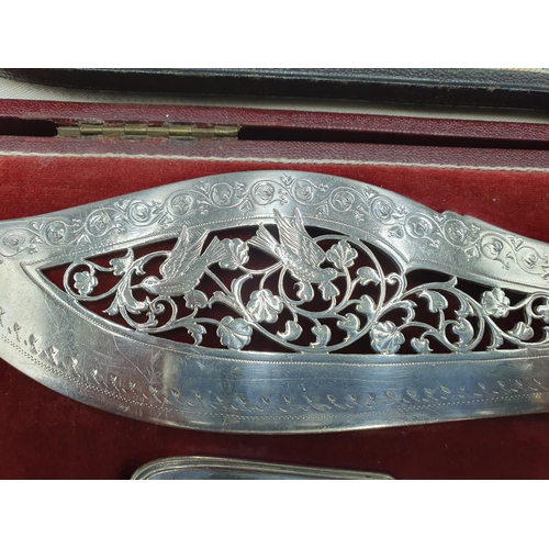 96 - Two pairs of plated Fish Servers engraved anglers, birds and leafage scrolls, both cased