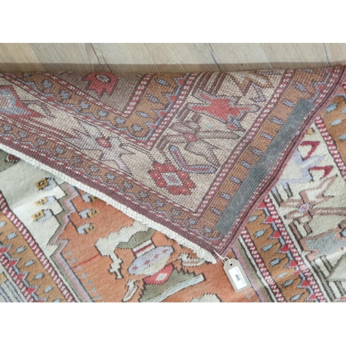 460 - A Persian Rug with stylised floral motifs on a red and cream ground, 5ft 6in x 3ft 4in (R7)