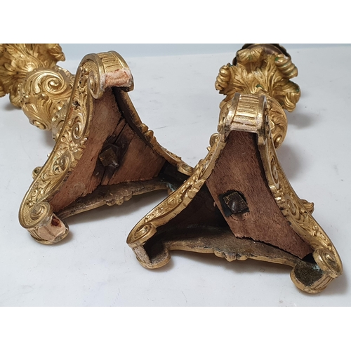 466 - A pair of French ormolu Candlesticks with leafage designs on scrolled supports (One missing its Scon... 