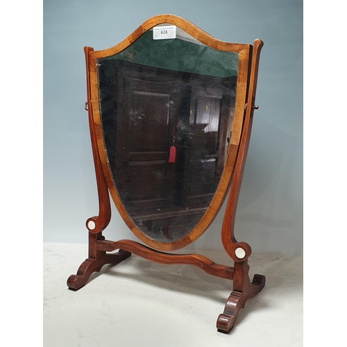 638 - A mahogany framed Shield Shaped Dressing Mirror on shaped supports. (R8).