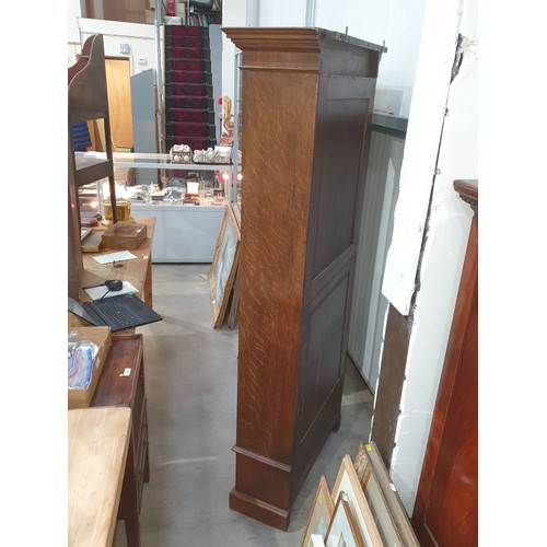 16 - An oak astragal glazed Bookcase with four adjustable shelves and fitted drawer to base, 6ft 4