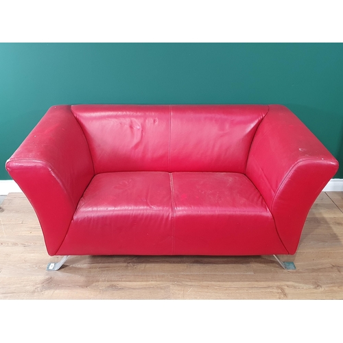 467 - A red leather style Two Seater Sofa on chrome bracket feet A/F, 5ft 2