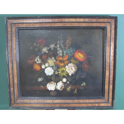 422 - CONTINENTAL SCHOOL. A Still Life of mixed flowers on a ledge oil on canvas, 20 x 24 in